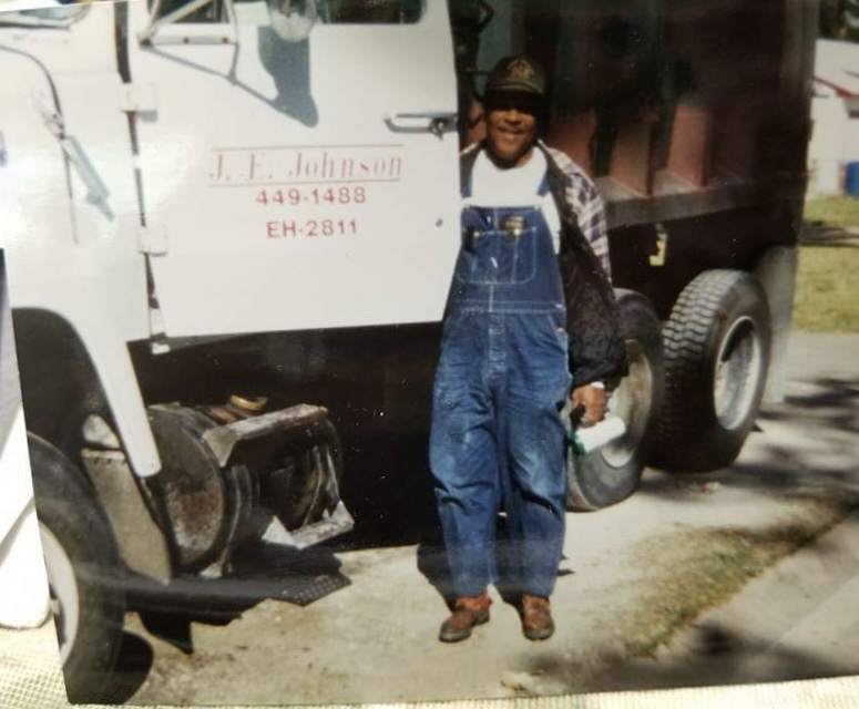 Fallon's grandfather with his dump truck in Houston